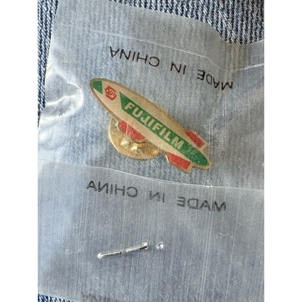 New In Bag Vintage FujiFilm Fuji Film Blimp Airship Lapel Strap or Hat Pin Mint